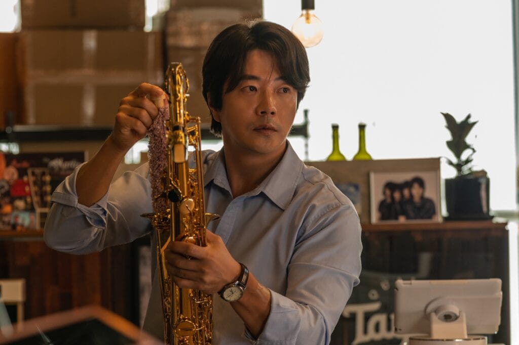 Kwon Sang Woo Is A Former Rock Band Vocalist Who Left His Dreams Behind In New Comedy Film